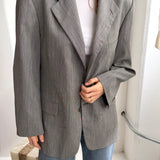 Button back blazer in Grey textured