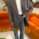 Blue checkered blazer with red elbow patches