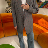 Blue checkered blazer with red elbow patches