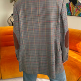 Blue checkered blazer with red elbow patches