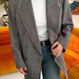 Blue checkered blazer with red elbow patches