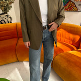 Green with plaid blazer