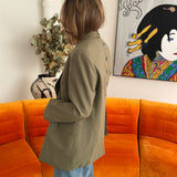 Green double breasted button back blazer in green