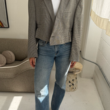 Cinched waist cropped blazer in black and white houndstooth with a subtle overcheck