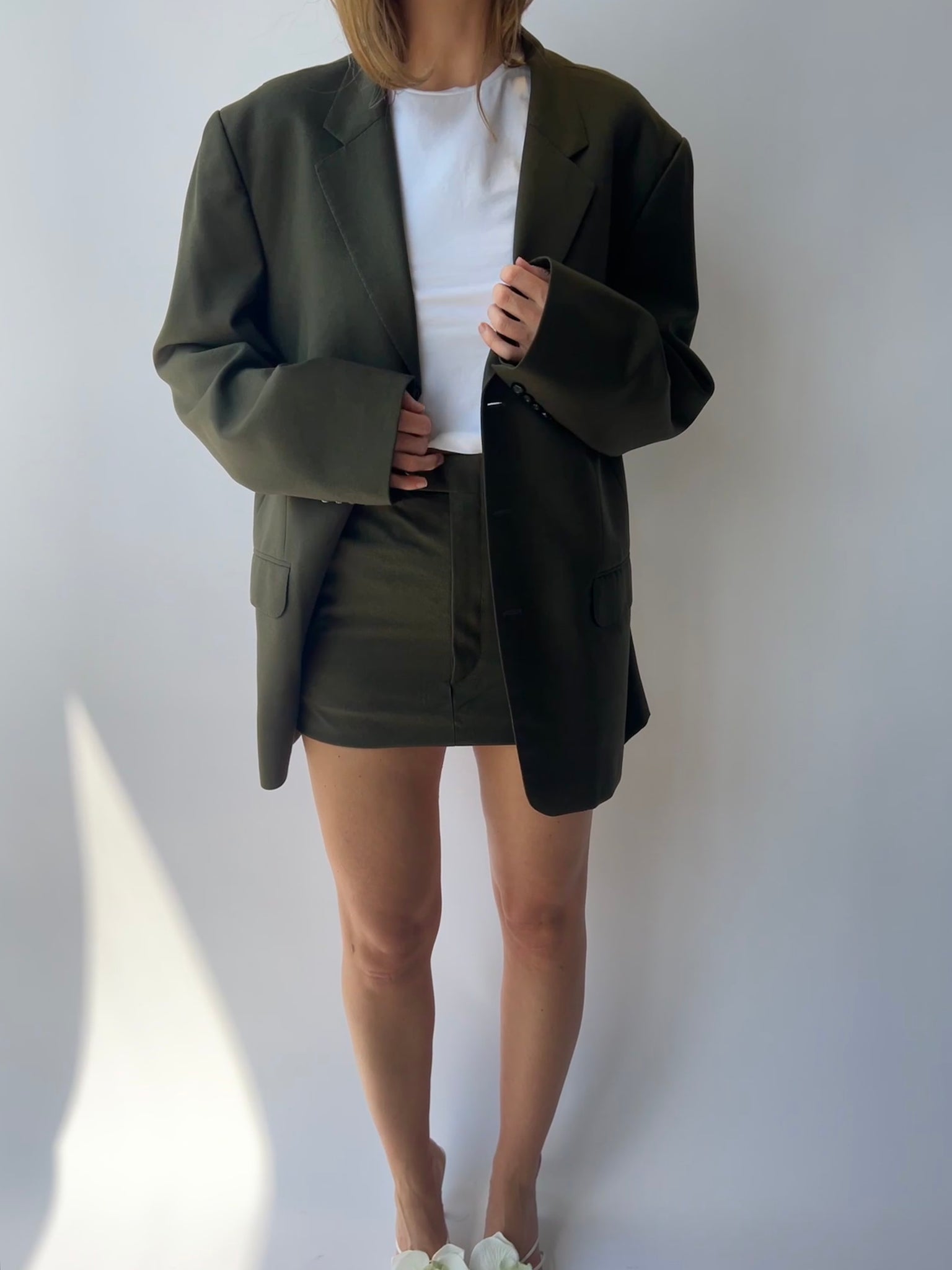 Green mini skirt and blazer