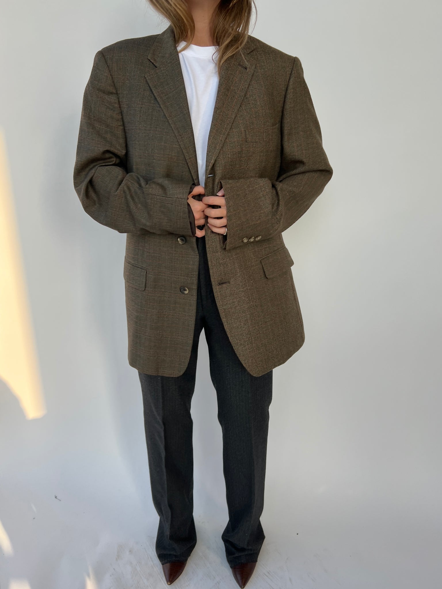 Warm plaid tones contrasted blazer