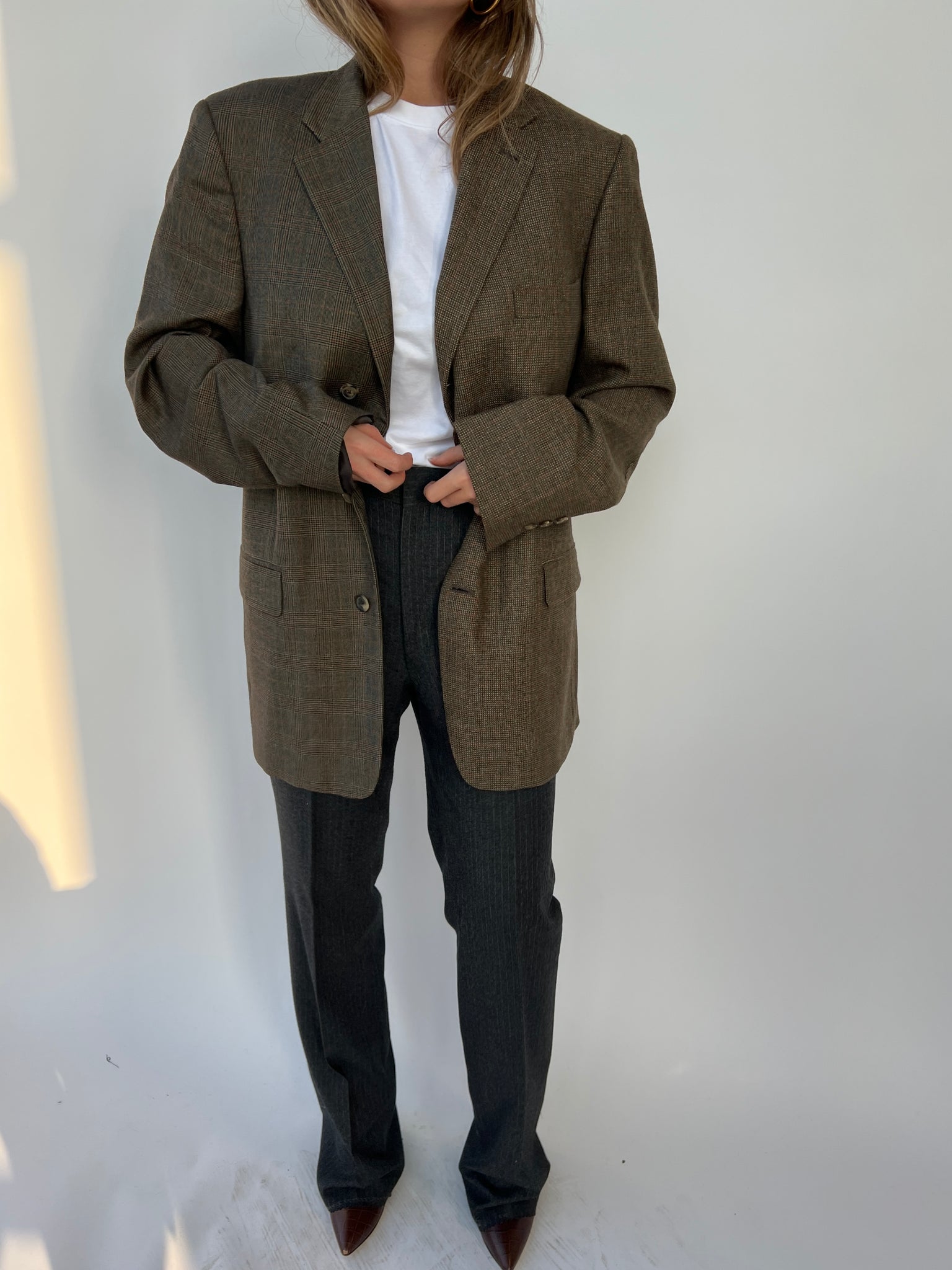 Warm plaid tones contrasted blazer