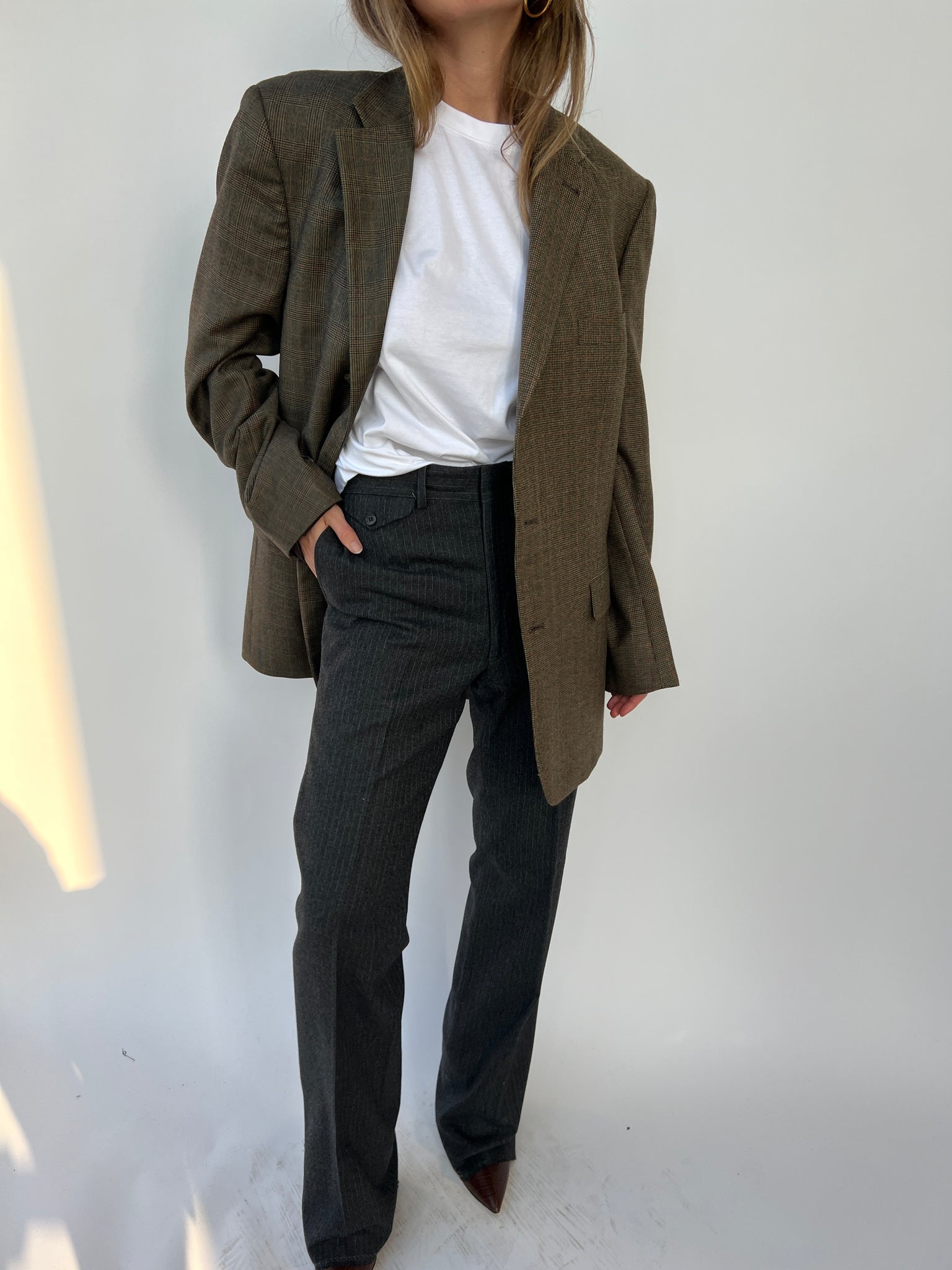 Warm plaid tones contrasted blazer