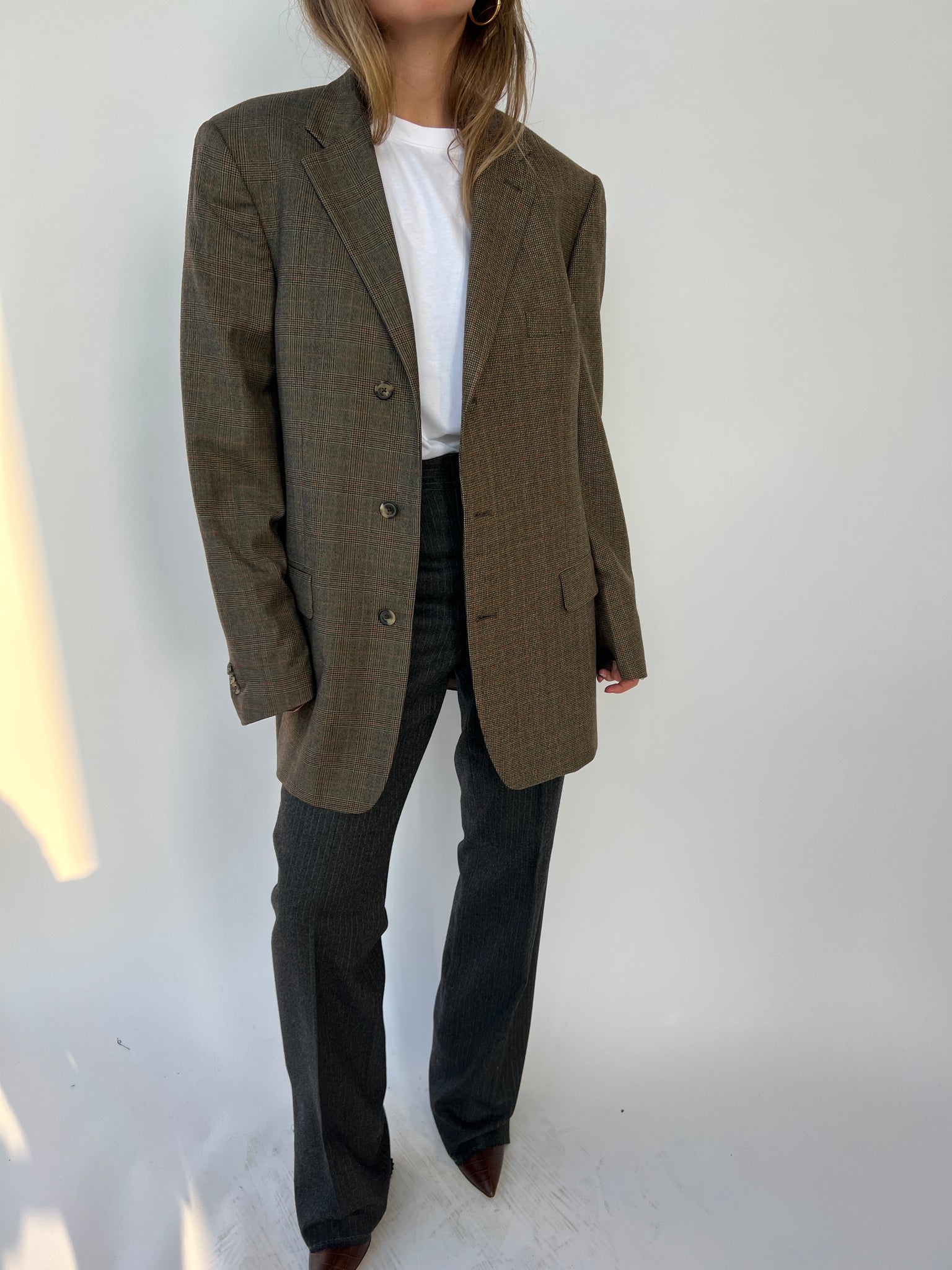 Warm plaid tones contrasted blazer