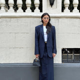 Navy pinstriped skirt suit