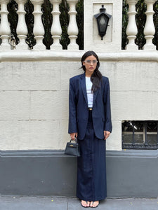 Navy pinstriped skirt suit