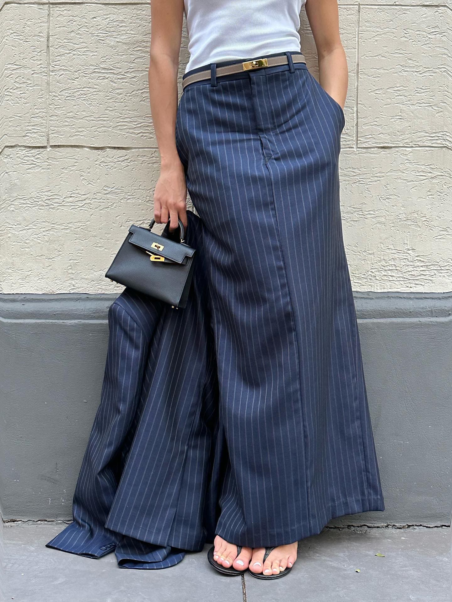 Navy pinstriped skirt suit