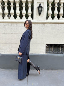 Navy pinstriped skirt suit