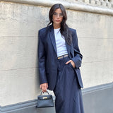 Navy pinstriped skirt suit