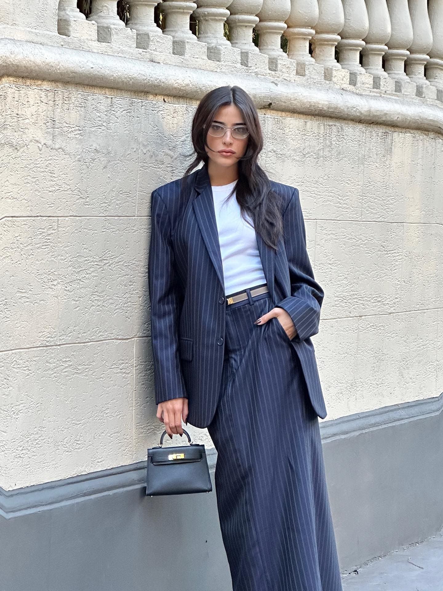 Navy pinstriped skirt suit