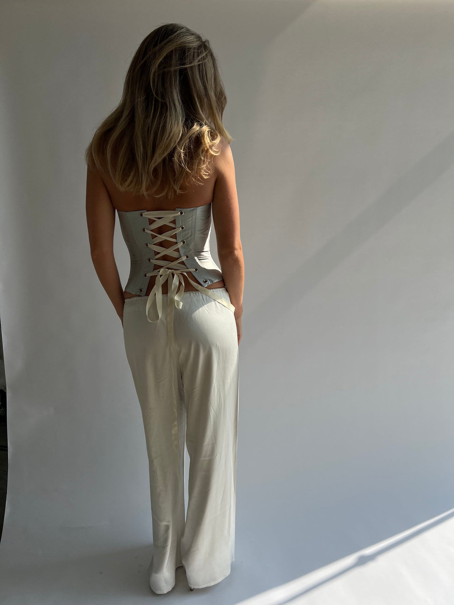 Silk corset in ice blue